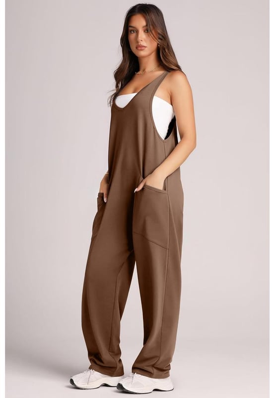 V.
  Ausschnitt.
  Breite Trager.
  Taschen.
  Blickdichter Stoff.
  Materialzusammensetzung: 60% Polyester 35% Baumwolle 5% Elasthan.
  Maschinenwasche kalt.
  Bei niedriger Temperatur im Trockner trocknen.
  Importiert.