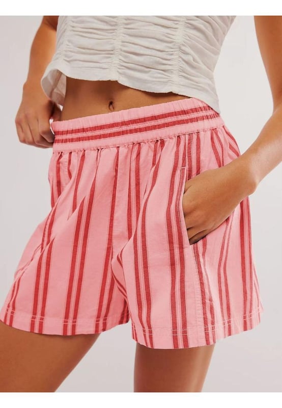 Striped Elastic Waist Shorts
  Pocketed design
  Opaque sheer
  Material composition: 65% polyester 35% cotton
  Care instructions: Machine wash cold tumble dry low
  Imported
  Product Measurements (inches):
  Size S: Bottom Length 14.2 Waist 26
  Size M: Bottom Length 14.6 Waist 27.6
  Size L: Bottom Length 15 Waist 29.9
  Size XL: Bottom Length 15.7 Waist 33.1