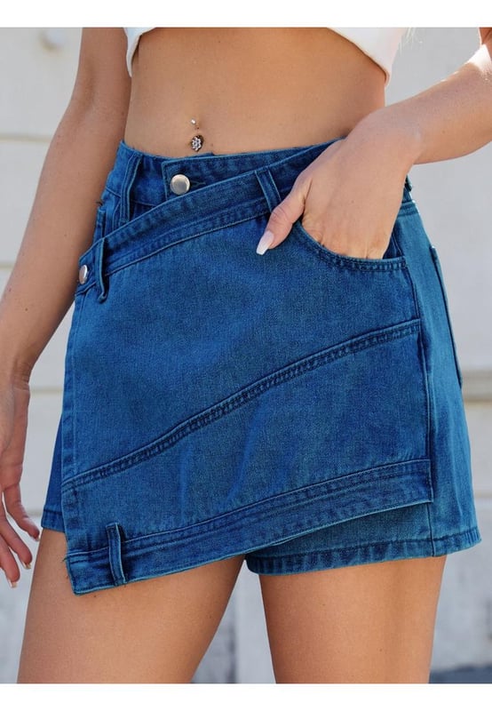 Asymmetrical design
  No stretch
  95% rayon 5% polyester
  Machine wash cold
  Tumble dry low
  Imported
  Available in sizes S to 2XL
  Size S: Waist 27.6 inches Hip 40.2 inches Bottom Length 13.8 inches
  Size M: Waist 29.5 inches Hip 42.1 inches Bottom Length 14.2 inches
  Size L: Waist 31.5 inches Hip 44.1 inches Bottom Length 14.6 inches
  Size XL: Waist 34.6 inches Hip 47.2 inches Bottom Length 15 inches
  Size 2XL: Waist 37.8 inches Hip 50.4 inches Bottom Length 15.4 inches
Material: Denim