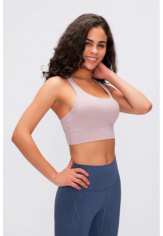 True to size
  Double
  X strappy back
  Supportive
  Material: 87% nylon 13% spandex
  Care: Machine wash cold. Do not tumble dry
  Imported
  S: length 12 in bust 26 in
  M: length 13 in bust 27 in
  L: length 13 in bust 29 in
  XL: length 13 in bust 30 in