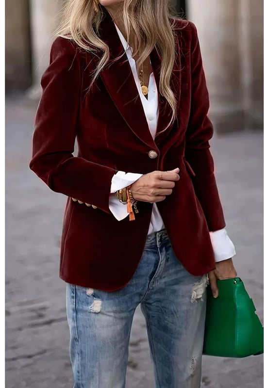 Lapel Collar One Button Blazer
  Features pockets and a single button closure
  Normal thickness
  Lined body
  Material composition: 100% polyester
  Care instructions: Machine wash cold tumble dry low
  Imported
  Sizes available: S (US 4) M (US 6/8) L (US 10/12) XL (US 14) 2XL (US 16)
  Bust measurements: S (37 inches) M (38.6 inches) L (40.9 inches) XL (43.3 inches) 2XL (45.7 inches)
  Top length measurements: S (26.8 inches) M (27.2 inches) L (27.6 inches) XL (28 inches) 2XL (28.3 inches)