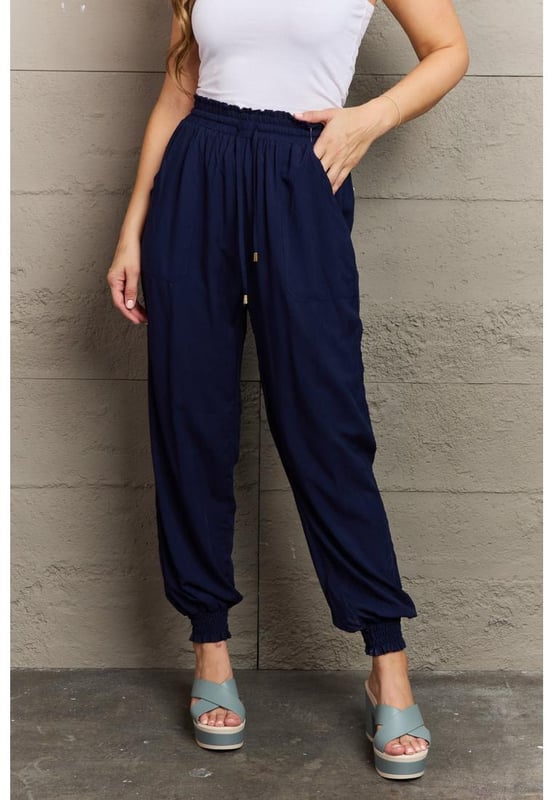 Pattern type: Solid
  Style: Casual
  Features: Tie Pockets
  Length: Long
  Material composition: 100% rayon
  Care instructions: Machine wash cold Tumble dry low
  Imported
  Product measurements:
  S: length 41 in waist 25
  32 in hip 43 in
  M: length 41 in waist 27
  34 in hip 45 in
  L: length 41 in waist 28
  36 in hip 47 in
  XL: length 42 in waist 32
  39 in hip 50 in