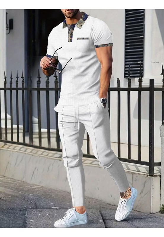 Basic style with buttoned details
  Includes pockets for added convenience
  Two
  piece set: short sleeve polo and pants
  Slightly stretchy material for comfort
  Made from 100% polyester
  Drawstring waist on pants for an adjustable fit
  Care instructions: Machine wash cold tumble dry low
  Imported
