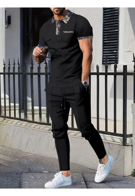 Basic style with buttoned details
  Includes pockets for added convenience
  Two
  piece set: short sleeve polo and pants
  Slightly stretchy material for comfort
  Made from 100% polyester
  Drawstring waist on pants for an adjustable fit
  Care instructions: Machine wash cold tumble dry low
  Imported