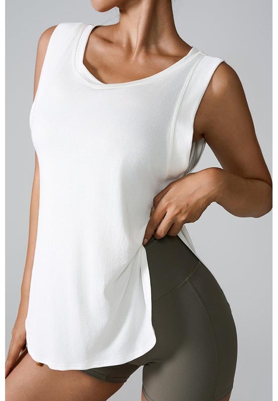 Estilo básico  
Opaco  
Altamente elástico  
Composición del material: 73% modal 27% poliéster  
Instrucciones de cuidado: Lavado a máquina en frío. Secado en secadora a baja temperatura.  
Importado  
Tamaño S (US 2/4): Longitud 24.4 pulgadas Bust 37.4 pulgadas  
Tamaño M (US 6/8): Longitud 24.8 pulgadas Bust 39 pulgadas  
Tamaño L (US 10): Longitud 25.2 pulgadas Bust 40.6 pulgadas  
Tamaño XL (US 12): Longitud 25.6 pulgadas Bust 42.1 pulgadas  