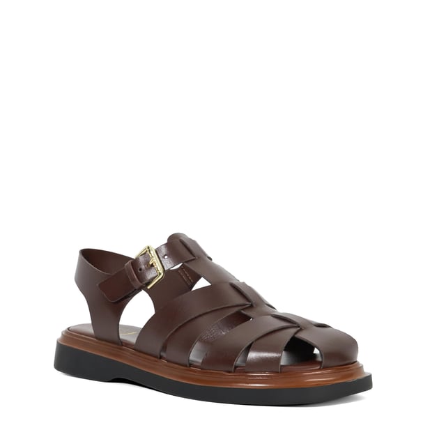 Lisherman redefines the classic beach sandal with its bold, contemporary design. Featuring a closed toe, adjustable ankle strap and a slight flatform sole for added lift, this chunky shoe combines style and comfort for a modern twist on a timeless classic.