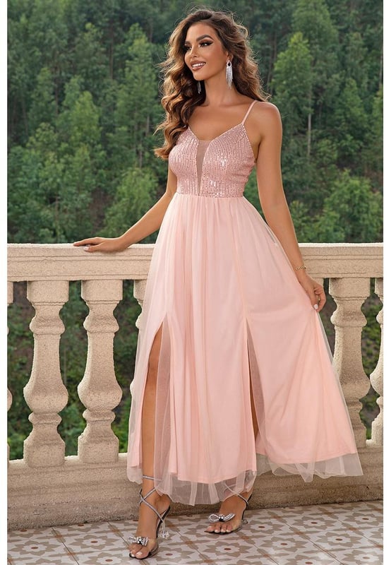 Producto: Vestido de malla con tirantes y abertura  
Características: Abertura  
Translúcido: Opaco  
Elasticidad: Ligeramente elástico  
Cuerpo: Sin forro  
Composición del material: 100% poliamida  
Instrucciones de cuidado: Lavar a máquina en frío, secar a baja temperatura  
Importado  
XS: longitud frontal 53.4 in, cadera 80.3 in, busto 27.3 in, cintura 24.6 in  
S: longitud frontal 54.2 in, cadera 81.9 in, busto 28.9 in, cintura 26.1 in  
M: longitud frontal 55 in, cadera 83.5 in, busto 30.4 in, cintura 27.7 in  
L: longitud frontal 56.2 in, cadera 85.8 in, busto 32.8 in, cintura 30 in