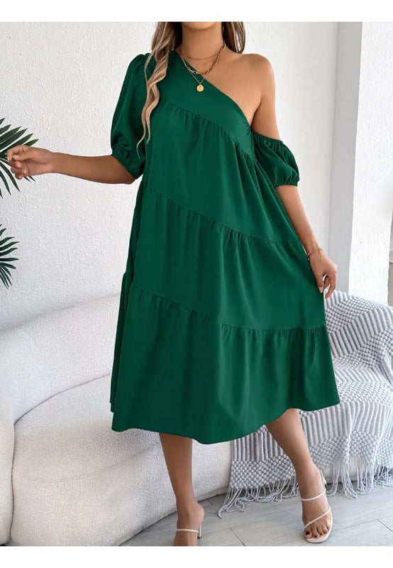 Asymmetrical design
  Tiered structure
  No stretch
  Body not lined
  Material composition: 95% polyester 5% elastane
  Care instructions: Machine wash cold tumble dry low
  Imported