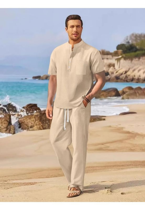 Zweiteiliges Set: Oberteil mit halben Knöpfen und Hose mit Kordelzug  
Basic-Stil mit geknöpftem Oberteil  
Leicht dehnbarem Material für Komfort  
Materialzusammensetzung: 95 % Baumwolle, 5 % Polyester  
Pflegehinweise: Maschinenwäsche kalt. Im Wäschetrockner bei niedriger Temperatur trocknen  
Importiert