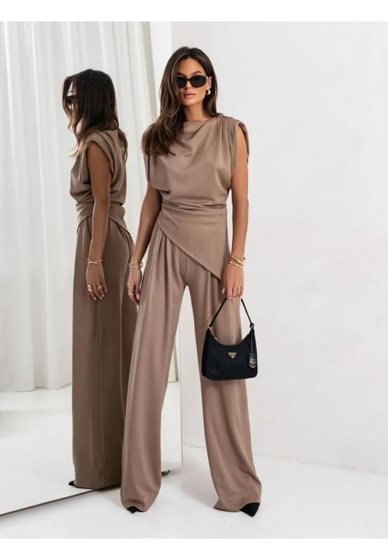 Slit Ruched Top and Wide Leg Pants Set
  Features: Slit Asymmetrical
  Number of pieces: Two
  piece
  Material composition: 95% polyester 5% spandex
  Care instructions: Machine wash cold. Tumble dry low.
  Imported