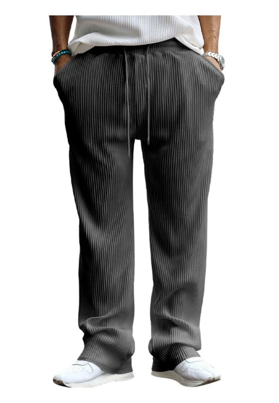 Estilo básico  
Textura acanalada  
Cintura con cordón ajustable  
Con bolsillos  
Composición del material: 95% poliéster 5% algodón  
Instrucciones de cuidado: Lavar a máquina en frío. Secar a baja temperatura  
Importado  
Disponible en tallas S a 3XL