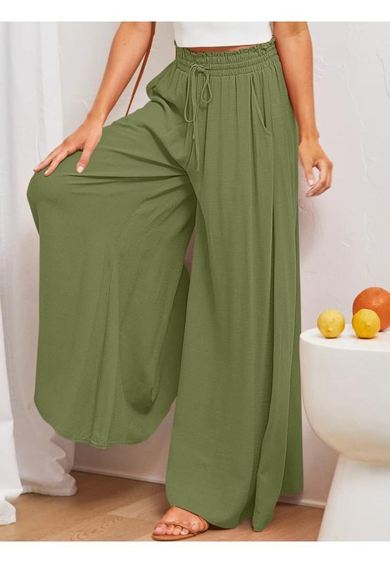 Brede Pantalon met Zakken
  Opaque stof
  Materiaalsamenstelling: 95% polyester 5% spandex
  Wasinstructies: Machinewas koud, drogen op lage temperatuur
  Geïmporteerd
  Maten (in inches):
  Maat S: Onderlengte 40.2 Taille 25.2 Heup 42.9
  Maat M: Onderlengte 40.6 Taille 26.8 Heup 44.5
  Maat L: Onderlengte 40.9 Taille 29.1 Heup 46.9
  Maat XL: Onderlengte 41.3 Taille 31.5 Heup 49.2
  Maat 2XL: Onderlengte 41.7 Taille 33.9 Heup 51.6