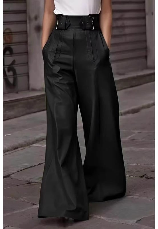 Weit ausgestellte Hose mit hoher Taille.
  Design mit Taschen.
  Blickdichtes Material.
  Materialzusammensetzung: 80% Polyurethan 20% Viskose.
  Pflegehinweis: Maschinenwasche kalt Trockner bei niedriger Temperatur.
  Importiert.