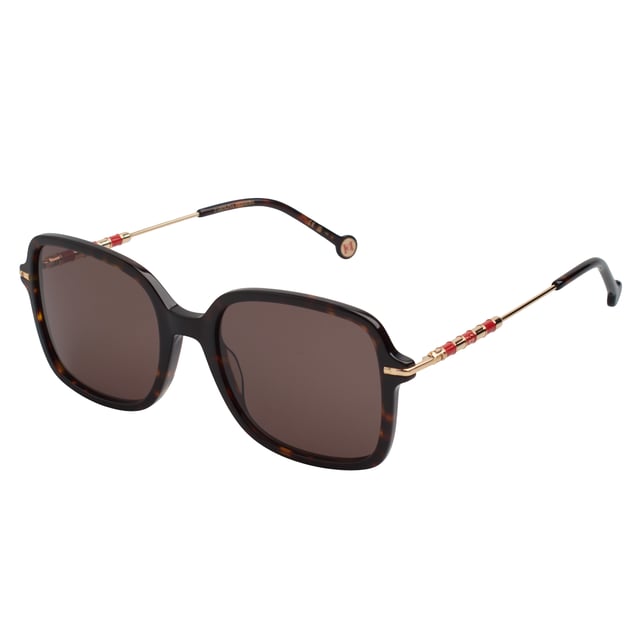 These Carolina Herrera sunglasses fuse elegant design with distinctive details that elevate any look with subtlety and sophistication.

 Shape and design:
 - These sunglasses feature a softly rounded square shape, providing visual balance and flattering a wide variety of faces.
 - The design is characterized by its enveloping structure and clean lines, which combine modernity with a timeless feel.

 Frame material:
 - The frame is made from a combination of acetate and metal, offering excellent durability with a refined finish.
 - Lightweight construction provides comfort even during extended use.

 Brand details:
 - Carolina Herrera logo inscription on temples.
 - Cylindrical metallic details with decorative stripes and the CH monogram provide visual identity and exclusivity to the design.

 Glasses:
 - Lenses with 100% UV protection filter, ideal for daily outdoor use.
 - Anti-reflective treatment that improves the visual experience and reduces glare.
 Measures: Lens width: 55 mm. Bridge: 20 mm. Temples: 145 mm
 Composition: Acetate, Metal
 Care:
Wash only with water or, if necessary, a mild soap.
 Dry with a soft cloth to avoid scratches.
 Avoid contact with harsh surfaces or abrasive liquids.