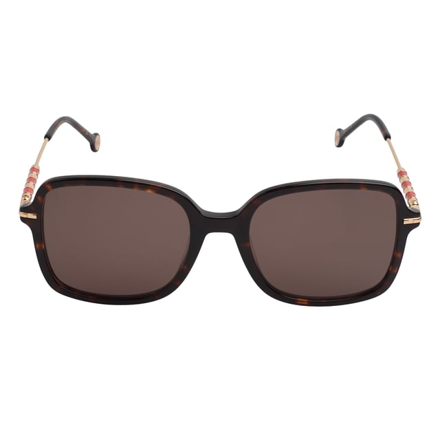 These Carolina Herrera sunglasses fuse elegant design with distinctive details that elevate any look with subtlety and sophistication.

 Shape and design:
 - These sunglasses feature a softly rounded square shape, providing visual balance and flattering a wide variety of faces.
 - The design is characterized by its enveloping structure and clean lines, which combine modernity with a timeless feel.

 Frame material:
 - The frame is made from a combination of acetate and metal, offering excellent durability with a refined finish.
 - Lightweight construction provides comfort even during extended use.

 Brand details:
 - Carolina Herrera logo inscription on temples.
 - Cylindrical metallic details with decorative stripes and the CH monogram provide visual identity and exclusivity to the design.

 Glasses:
 - Lenses with 100% UV protection filter, ideal for daily outdoor use.
 - Anti-reflective treatment that improves the visual experience and reduces glare.
 Measures: Lens width: 55 mm. Bridge: 20 mm. Temples: 145 mm
 Composition: Acetate, Metal
 Care:
Wash only with water or, if necessary, a mild soap.
 Dry with a soft cloth to avoid scratches.
 Avoid contact with harsh surfaces or abrasive liquids.