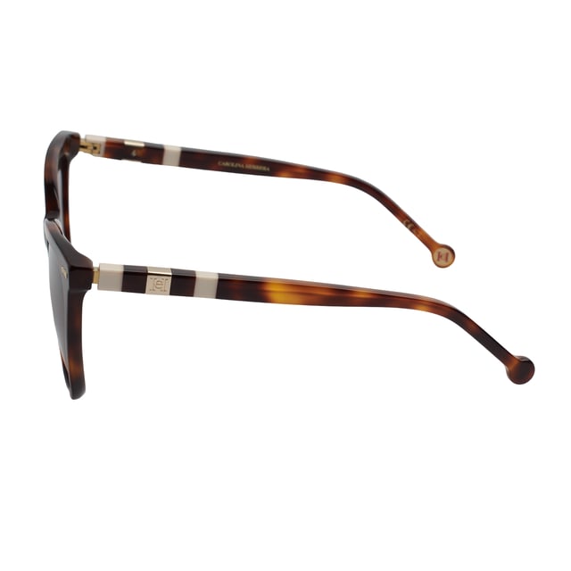 Cat-eye style sunglasses for women with acetate frames.

 Shape and design:
 - These Carolina Herrera sunglasses have a cat-eye silhouette.
 - The cat-eye silhouette gives the glasses a modern and edgy look.

 Frame material:
 - The frame of these glasses is made of acetate, a plastic material.
 - Acetate provides durability, flexibility and a smooth finish to the frame.
 - This makes the glasses durable and comfortable to wear.

 Acetate temples:
 - The temples are also made of acetate, matching the frame material.
 - The acetate on the temples makes them lightweight and comfortable to wear.

 Brand details:
 - Brand logo Carolina Herrera engraved on the temples.
 - These design elements help clearly identify the model as part of the Carolina Herrera eyewear collection.
 - All our products are shipped in their original packaging, along with certificates of authenticity and warranty.

 Glasses:
 - The lenses are of high quality.
 - 100% UVB 400 protection.
 - Anti-reflective glass.
 Measures: Lens height: 46 mm. Lens width: 55 mm. Bridge: 18 mm. Temples: 145 mm.
 Composition: Acetate
 Care:
Wash only with water or, if necessary, a mild soap.
 Dry with a soft cloth to avoid scratches.
 Avoid contact with harsh surfaces or abrasive liquids.