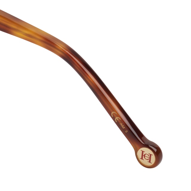 Designed with a wraparound silhouette and smooth lines, these Carolina Herrera sunglasses offer a refined interpretation of the classic square design, ideal for those seeking functional elegance and timeless style.

 Shape and design:
 - Softened square shape that adapts harmoniously to different face types.
 - Wide design provides superior visual coverage and a touch of sophistication at every angle.

 Frame material:
 - Made of high-quality acetate, durable and lightweight, ensuring a comfortable fit all day long.

 Brand details:
 - Carolina Herrera logo inscription on temples.

 Glasses:
 - Lenses with 100% UV protection filter, ideal for daily outdoor use.
 - Anti-reflective treatment that improves the visual experience and reduces glare.
 Measures: Lens width: 57 mm. Bridge: 18 mm. Temples: 145 mm
 Composition: Acetate
 Care:
Wash only with water or, if necessary, a mild soap.
 Dry with a soft cloth to avoid scratches.
 Avoid contact with harsh surfaces or abrasive liquids.