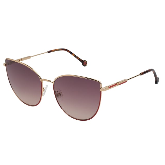 These Carolina Herrera sunglasses combine sleek lines with a sophisticated aesthetic, creating an iconic design designed for women who want to stand out with elegance without sacrificing modernity.

 Shape and design:
 - Cat-eye silhouette with a defined contour, which enhances and stylizes facial features.

 Frame material:
 - Ultra-light metal structure that provides strength and long-lasting comfort.
 - Slim temples with curved tips, ensuring an ergonomic fit.

 Brand details:
 - Distinctive circular logo at the end of the temples.
 - Rods decorated with linear elements that add a touch of exclusive design.

 Glasses:
 - 100% UV protection lenses for safe sun coverage.
 Measures: Lens width: 59 mm. Bridge: 17 mm. Temples: 145 mm
 Composition: Metal
 Care:
Wash only with water or, if necessary, a mild soap.
 Dry with a soft cloth to avoid scratches.
 Avoid contact with harsh surfaces or abrasive liquids.
