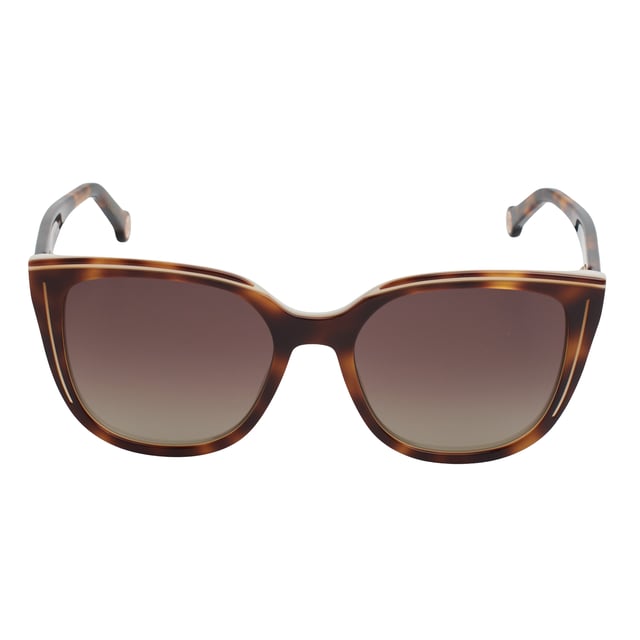 These Carolina Herrera sunglasses fuse elegant design with distinctive details that elevate any look with subtlety and sophistication. With a carefully crafted structure and refined finishes, they're the ideal accessory for those seeking style and protection with a distinct identity.

 Shape and design:
 - Soft cat-eye silhouette frame, ideal for enhancing features and adding a feminine touch with character.
 - Wraparound style that offers balanced visual coverage.

 Frame material:
 - High-quality acetate structure that provides strength and lightness.

 Brand details:
 - Carolina Herrera logo engraved on temples.
 - Rounded terminals with embossed CH metal logo, providing identity without excess.

 Glasses:
 - Lenses with 100% UV protection filter, ideal for daily outdoor use.
 Measures: Lens width: 53 mm. Bridge: 18 mm. Temples: 145 mm
 Composition: Acetate
 Care:
Wash only with water or, if necessary, a mild soap.
 Dry with a soft cloth to avoid scratches.
 Avoid contact with harsh surfaces or abrasive liquids.
