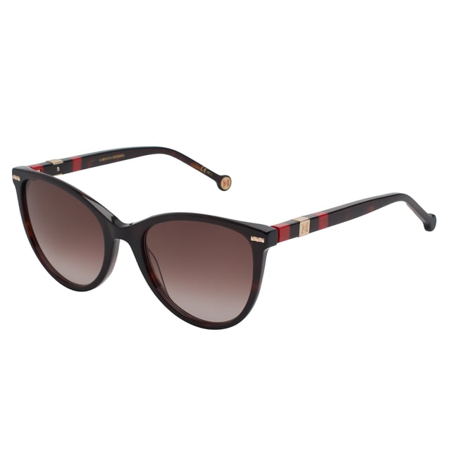 These Carolina Herrera sunglasses embody classic elegance reinterpreted with a contemporary approach. Their refined and understated design is designed for those who value sophistication in the smallest details, offering a timeless, feminine silhouette that blends harmoniously with a variety of styles.

 Shape and design:
 - Softened cat-eye silhouette, which delicately enhances the contours of the face.
 - Clean aesthetics with defined lines.

 Frame material:
 - High quality acetate structure.
 - Slim temples with decorative metal inserts provide an elegant contrast.

 Brand details:
 - CH initials precisely inlaid on the tips and metal details along the temples.

 Glasses:
 - 100% UV protection filter lenses provide safe sun coverage.
 - Anti-reflective coating for clearer, more comfortable vision under different lighting conditions.
 Measures: Lens width: 57 mm. Bridge: 20 mm. Temples: 145 mm
 Composition: Acetate
 Care:
Wash only with water or, if necessary, a mild soap.
 Dry with a soft cloth to avoid scratches.
 Avoid contact with harsh surfaces or abrasive liquids.