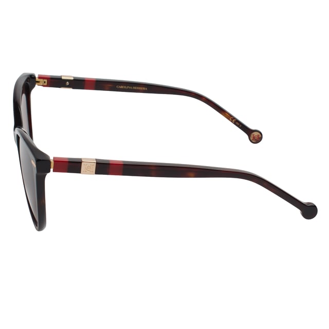 These Carolina Herrera sunglasses embody classic elegance reinterpreted with a contemporary approach. Their refined and understated design is designed for those who value sophistication in the smallest details, offering a timeless, feminine silhouette that blends harmoniously with a variety of styles.

 Shape and design:
 - Softened cat-eye silhouette, which delicately enhances the contours of the face.
 - Clean aesthetics with defined lines.

 Frame material:
 - High quality acetate structure.
 - Slim temples with decorative metal inserts provide an elegant contrast.

 Brand details:
 - CH initials precisely inlaid on the tips and metal details along the temples.

 Glasses:
 - 100% UV protection filter lenses provide safe sun coverage.
 - Anti-reflective coating for clearer, more comfortable vision under different lighting conditions.
 Measures: Lens width: 57 mm. Bridge: 20 mm. Temples: 145 mm
 Composition: Acetate
 Care:
Wash only with water or, if necessary, a mild soap.
 Dry with a soft cloth to avoid scratches.
 Avoid contact with harsh surfaces or abrasive liquids.