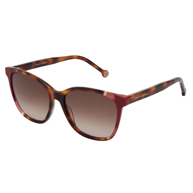 Estas gafas de sol Carolina Herrera destacan por su equilibrio entre sofisticación y frescura. Su forma envolvente y el contraste de colores en el frontal aportan un estilo refinado y contemporáneo, ideal para mujeres que desean realzar su look con un accesorio distintivo y femenino.

Forma y diseño:
- Silueta mariposa suavemente angular, que aporta carácter sin perder elegancia.
- Puente ligeramente arqueado y patillas curvas para un ajuste cómodo y seguro.

Material de la montura:
- La montura de estas gafas está fabricada en acetato, un material plástico.
- El acetato proporciona durabilidad, flexibilidad y un acabado liso a la montura.

Patillas de acetato:
- Las patillas también están hechas de acetato, a juego con el material de la montura.
- El acetato en las patillas las hace livianas y cómodas de llevar.

Detalles de la marca:
- Grabado de la marca Carolina Herrera en las patillas.
- Estos elementos de diseño ayudan a identificar claramente el modelo como parte de la colección de gafas Carolina Herrera.

Lentes:
- Lentes con protección UV 100%.

Contenido: 
- Gafas de sol, estuche, pañuelo y folleto.
 Medidas: Alto lente: 49 mm. Ancho lente: 57 mm. Puente: 16 mm. Patillas: 145 mm.
 Composición: Acetato
 Cuidados:
Lavar solo con agua o, si fuese necesario, un jabón suave.
Secar con el paño suave para evitar rayaduras.
Evitar el contacto con superficies rigurosas o líquidos abrasivos.