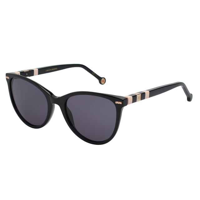 These Carolina Herrera sunglasses embody classic elegance reinterpreted with a contemporary approach. Their refined and understated design is designed for those who value sophistication in the smallest details, offering a timeless, feminine silhouette that blends harmoniously with a variety of styles.

 Shape and design:
 - Softened cat-eye silhouette, which delicately enhances the contours of the face.
 - Clean aesthetics with defined lines.

 Frame material:
 - High quality acetate structure.
 - Slim temples with decorative metal inserts provide an elegant contrast.

 Brand details:
 - CH initials precisely inlaid on the tips and metal details along the temples.

 Glasses:
 - 100% UV protection filter lenses provide safe sun coverage.
 - Anti-reflective coating for clearer, more comfortable vision under different lighting conditions.
 Measures: Lens width: 57 mm. Bridge: 20 mm. Temples: 145 mm
 Composition: Acetate
 Care:
Wash only with water or, if necessary, a mild soap.
 Dry with a soft cloth to avoid scratches.
 Avoid contact with harsh surfaces or abrasive liquids.