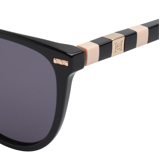 These Carolina Herrera sunglasses embody classic elegance reinterpreted with a contemporary approach. Their refined and understated design is designed for those who value sophistication in the smallest details, offering a timeless, feminine silhouette that blends harmoniously with a variety of styles.

 Shape and design:
 - Softened cat-eye silhouette, which delicately enhances the contours of the face.
 - Clean aesthetics with defined lines.

 Frame material:
 - High quality acetate structure.
 - Slim temples with decorative metal inserts provide an elegant contrast.

 Brand details:
 - CH initials precisely inlaid on the tips and metal details along the temples.

 Glasses:
 - 100% UV protection filter lenses provide safe sun coverage.
 - Anti-reflective coating for clearer, more comfortable vision under different lighting conditions.
 Measures: Lens width: 57 mm. Bridge: 20 mm. Temples: 145 mm
 Composition: Acetate
 Care:
Wash only with water or, if necessary, a mild soap.
 Dry with a soft cloth to avoid scratches.
 Avoid contact with harsh surfaces or abrasive liquids.