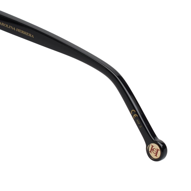 These Carolina Herrera sunglasses embody classic elegance reinterpreted with a contemporary approach. Their refined and understated design is designed for those who value sophistication in the smallest details, offering a timeless, feminine silhouette that blends harmoniously with a variety of styles.

 Shape and design:
 - Softened cat-eye silhouette, which delicately enhances the contours of the face.
 - Clean aesthetics with defined lines.

 Frame material:
 - High quality acetate structure.
 - Slim temples with decorative metal inserts provide an elegant contrast.

 Brand details:
 - CH initials precisely inlaid on the tips and metal details along the temples.

 Glasses:
 - 100% UV protection filter lenses provide safe sun coverage.
 - Anti-reflective coating for clearer, more comfortable vision under different lighting conditions.
 Measures: Lens width: 57 mm. Bridge: 20 mm. Temples: 145 mm
 Composition: Acetate
 Care:
Wash only with water or, if necessary, a mild soap.
 Dry with a soft cloth to avoid scratches.
 Avoid contact with harsh surfaces or abrasive liquids.