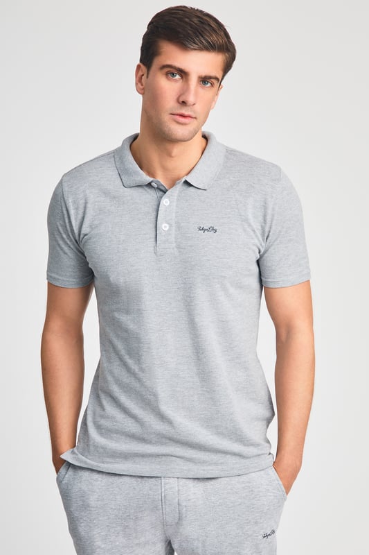 This 2-piece Tokyo Laundry outfit set includes a cotton polo shirt and matching brushed-back fleece shorts. Both pieces feature a soft-handle print for added style and comfort. Ideal for casual wear, this set offers a coordinated, laid-back look with premium fabric and design. Perfect for everyday lounging or outings.