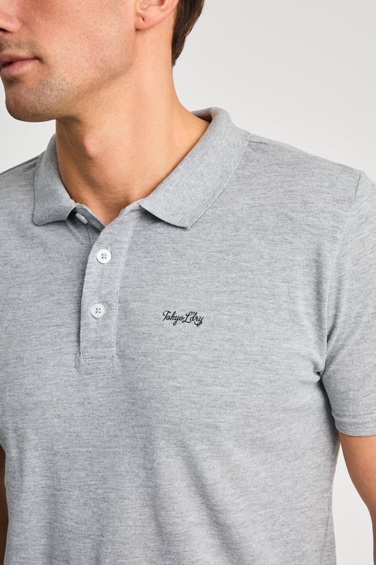 This 2-piece Tokyo Laundry outfit set includes a cotton polo shirt and matching brushed-back fleece shorts. Both pieces feature a soft-handle print for added style and comfort. Ideal for casual wear, this set offers a coordinated, laid-back look with premium fabric and design. Perfect for everyday lounging or outings.