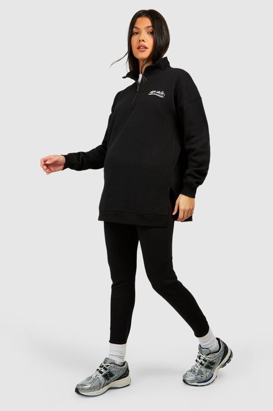 Maternity-friendly oversized sweat top with half-zip design
        Comfortable rib leggings for growing bump
        Coordinated set for effortless style
        Practical front pocket on sweat top
        Versatile for various casual occasions
    
    Embrace comfort and style during your pregnancy with this chic maternity tracksuit set from Boohoo. The oversized sweat top features a trendy half-zip design, perfect for adjustable ventilation and easy nursing access. Paired with ribbed leggings that accommodate your growing bump, this set offers both flexibility and fashion-forward appeal. Style the top with the zip partially undone, revealing a contrasting layer underneath for added interest. For a laid-back weekend look, team with chunky trainers and a crossbody bag. Alternatively, dress it up for a casual lunch date by adding statement earrings and swapping trainers for stylish slip-on mules. This versatile set is ideal for family gatherings, relaxed outings with friends, or simply lounging at home in comfort and style.