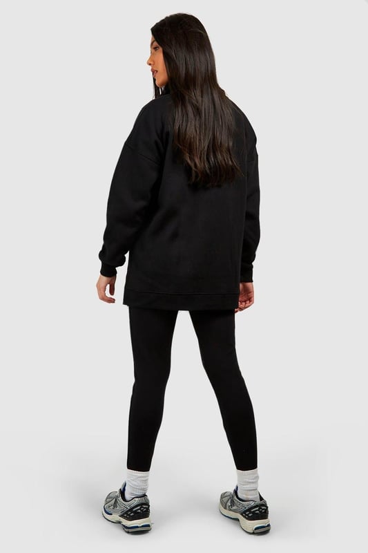 Maternity-friendly oversized sweat top with half-zip design
        Comfortable rib leggings for growing bump
        Coordinated set for effortless style
        Practical front pocket on sweat top
        Versatile for various casual occasions
    
    Embrace comfort and style during your pregnancy with this chic maternity tracksuit set from Boohoo. The oversized sweat top features a trendy half-zip design, perfect for adjustable ventilation and easy nursing access. Paired with ribbed leggings that accommodate your growing bump, this set offers both flexibility and fashion-forward appeal. Style the top with the zip partially undone, revealing a contrasting layer underneath for added interest. For a laid-back weekend look, team with chunky trainers and a crossbody bag. Alternatively, dress it up for a casual lunch date by adding statement earrings and swapping trainers for stylish slip-on mules. This versatile set is ideal for family gatherings, relaxed outings with friends, or simply lounging at home in comfort and style.