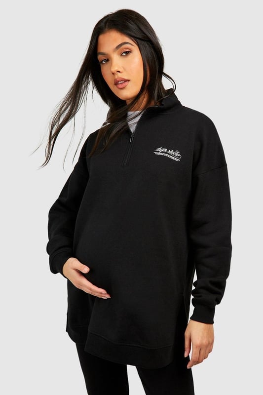 Maternity-friendly oversized sweat top with half-zip design
        Comfortable rib leggings for growing bump
        Coordinated set for effortless style
        Practical front pocket on sweat top
        Versatile for various casual occasions
    
    Embrace comfort and style during your pregnancy with this chic maternity tracksuit set from Boohoo. The oversized sweat top features a trendy half-zip design, perfect for adjustable ventilation and easy nursing access. Paired with ribbed leggings that accommodate your growing bump, this set offers both flexibility and fashion-forward appeal. Style the top with the zip partially undone, revealing a contrasting layer underneath for added interest. For a laid-back weekend look, team with chunky trainers and a crossbody bag. Alternatively, dress it up for a casual lunch date by adding statement earrings and swapping trainers for stylish slip-on mules. This versatile set is ideal for family gatherings, relaxed outings with friends, or simply lounging at home in comfort and style.