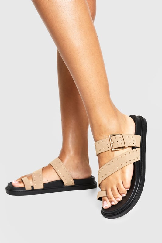 We'll make sure your shoes keep you one stylish step ahead of the crowdWhether you're keeping it simple in sliders, living the high life in heels or joining the fash pack in flatforms, you'll be heading to shoe heaven with our fashion-forward footwear collection. Boots are your day-to-night bestfriend, giving a floral dress&nbsp;that tough twist - add a biker jacket for even more attitude. Find your summer feet in jelly sandals and enjoy balmy nights in block heels.