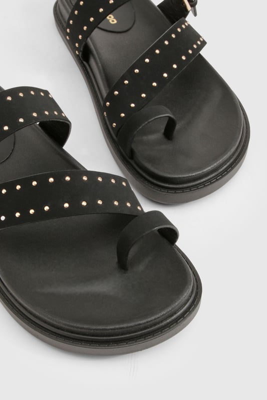 We'll make sure your shoes keep you one stylish step ahead of the crowdWhether you're keeping it simple in sliders, living the high life in heels or joining the fash pack in flatforms, you'll be heading to shoe heaven with our fashion-forward footwear collection. Boots are your day-to-night bestfriend, giving a floral dress&nbsp;that tough twist - add a biker jacket for even more attitude. Find your summer feet in jelly sandals and enjoy balmy nights in block heels.