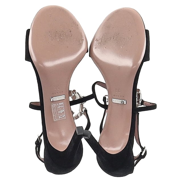 VINTAGE, RRP AS NEW
Step into high-impact elegance with the Gucci Interlocking G Ankle Strap Sandals. Crafted from plush black suede, these sandals dazzle with crystal embellishments that catch the light from every angle. The standout feature—a crystal-encrusted GG logo—adds signature sparkle, while the wrap-around ankle straps bring sensuality and secure comfort. Designed for those who move with confidence, these heels are pure evening glamour with unmistakable Gucci DNA.


Gucci Interlocking G Embellished Ankle Strap Sandals in Black Suede 
Condition: Very good
Signs of wear: Minor markings, Lightly used but very well maintained. Minor mark at soles & creasing, light scuffing at the soles and heels.
Packaging: None
Color: black
Material: Suede | suede
Size: EU | 36
Measurements: Heel height: 85; Insole length: 260
SKU: NAPPUGBSH492833W