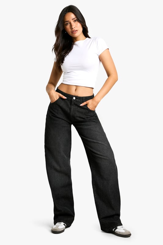Designed specifically for taller frames with extra length in the leg
        Relaxed boyfriend fit with a comfortable, loose silhouette
        Classic five-pocket design with traditional stitching detail
        Wide leg opening for a contemporary, fashion-forward look
        Slight stretch in the fabric allows for comfortable all-day wear
    
    These Tall Basic Boyfriend-Jeans from Boohoo offer the perfect balance of comfort and style for the fashion-conscious woman. The relaxed fit creates an effortlessly cool silhouette while the cotton-rich fabric ensures breathability and durability for everyday wear. As shown, they pair brilliantly with a fitted crop top and trainers for a casual daytime look, or dress them up with a bodysuit and heels for evening drinks with friends. The versatile design makes these jeans ideal for weekend brunches, shopping trips, or casual Friday workwear. Their wide-leg style works wonderfully with both oversized and fitted tops, allowing you to customise your look according to the occasion. A wardrobe essential that combines timeless appeal with contemporary styling.