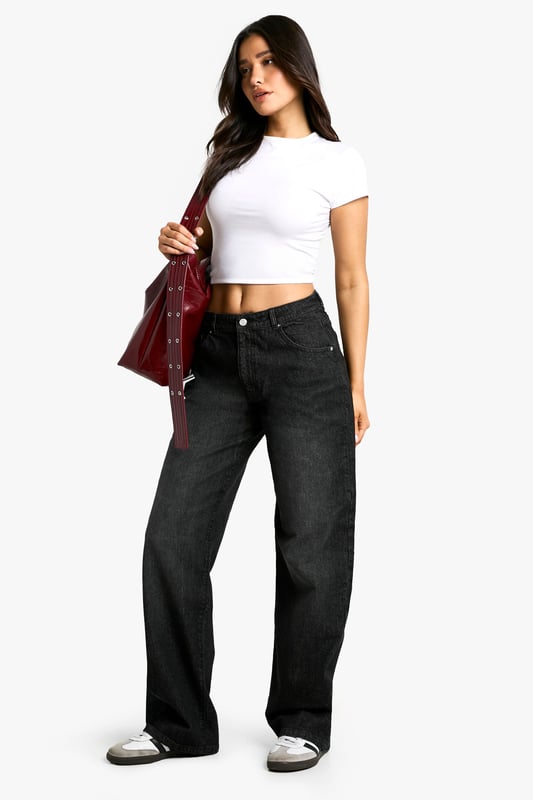 Designed specifically for taller frames with extra length in the leg
        Relaxed boyfriend fit with a comfortable, loose silhouette
        Classic five-pocket design with traditional stitching detail
        Wide leg opening for a contemporary, fashion-forward look
        Slight stretch in the fabric allows for comfortable all-day wear
    
    These Tall Basic Boyfriend-Jeans from Boohoo offer the perfect balance of comfort and style for the fashion-conscious woman. The relaxed fit creates an effortlessly cool silhouette while the cotton-rich fabric ensures breathability and durability for everyday wear. As shown, they pair brilliantly with a fitted crop top and trainers for a casual daytime look, or dress them up with a bodysuit and heels for evening drinks with friends. The versatile design makes these jeans ideal for weekend brunches, shopping trips, or casual Friday workwear. Their wide-leg style works wonderfully with both oversized and fitted tops, allowing you to customise your look according to the occasion. A wardrobe essential that combines timeless appeal with contemporary styling.