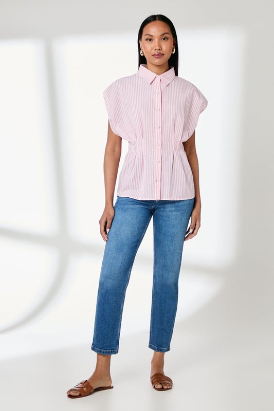Elegant striped shirt with distinctive pleat detailing for a flattering silhouette
        Crafted from a cotton-linen blend for breathable comfort throughout the day
        Classic collared neckline with full button-through fastening
        Relaxed cap sleeves create a contemporary, effortless look
        Cinched waist pleats add structure and feminine shaping
    
    This Principles striped shirt combines timeless style with modern detailing, making it a versatile addition to your wardrobe. The structured pleats create a beautifully tailored effect at the waist, whilst the relaxed cap sleeves offer a contemporary twist on a classic design. Style with straight-leg jeans and leather sandals for casual weekend brunches, or tuck into tailored trousers with ballet flats for a polished office ensemble. The cotton-linen blend ensures this piece remains comfortable for all-day wear, whether you're running errands or meeting friends for coffee. Layer under a lightweight cardigan when the temperature drops, or wear open over a simple vest top for a more relaxed approach. This shirt works beautifully for family gatherings or casual daytime events where understated elegance is key.