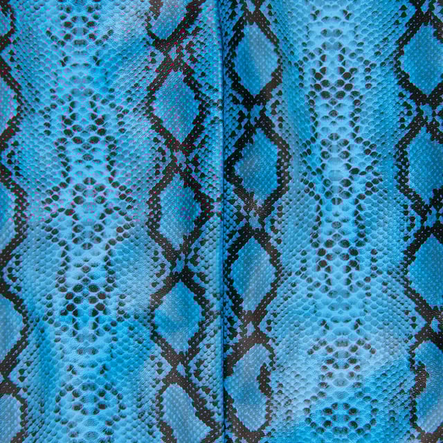 Snake print dress with a split hem and zipper at the back.