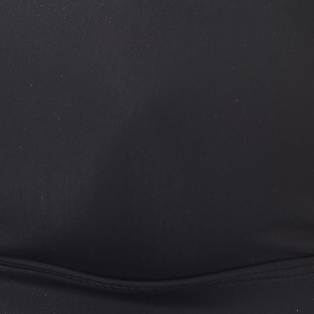 Black 

Elevate your workout attire with the Onzie Medium Support Strappy Sports Bra in sleek black. Made from 100% polyester, this sports bra offers a comfortable and breathable fit. The strappy design not only adds a stylish flair but also provides medium support, making it perfect for yoga, pilates, or any moderate-intensity activity. The soft fabric ensures you stay comfortable throughout your workout, while the chic design keeps you looking great both in and out of the gym. Add this versatile piece to your activewear collection for a blend of fashion and function.
