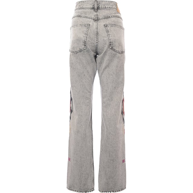 Straight-leg non-stretch denim jeans. Fading throughout. Featuring a leather logo patch at back waistband, graphic pattern embroidered at outseams and 5 pocket styling