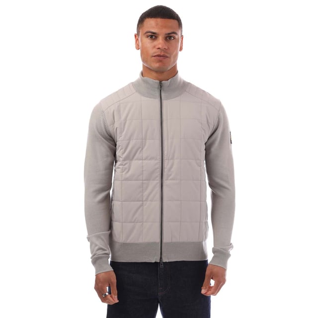 Mens Belstaff Kelbrook Zip Cardigan in chrome grey.- Ribbed stand-up collar.- Two-way zip centre front closure- Ribbed cuffs and hem.- Channel quilted shoulder reinforcement detailing- Quilted mixed media body- Belstaff phoenix patch on left sleeve- Non-mulesed  extra fine merino wool.- Slim fit.- Body: 100% Wool. Woven: 100% Polyester. Filling: 100% Polyester.  Hand wash - dry clean.- Ref: 105303CRGRY