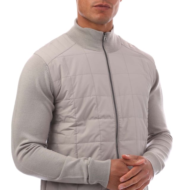 Mens Belstaff Kelbrook Zip Cardigan in chrome grey.- Ribbed stand-up collar.- Two-way zip centre front closure- Ribbed cuffs and hem.- Channel quilted shoulder reinforcement detailing- Quilted mixed media body- Belstaff phoenix patch on left sleeve- Non-mulesed  extra fine merino wool.- Slim fit.- Body: 100% Wool. Woven: 100% Polyester. Filling: 100% Polyester.  Hand wash - dry clean.- Ref: 105303CRGRY