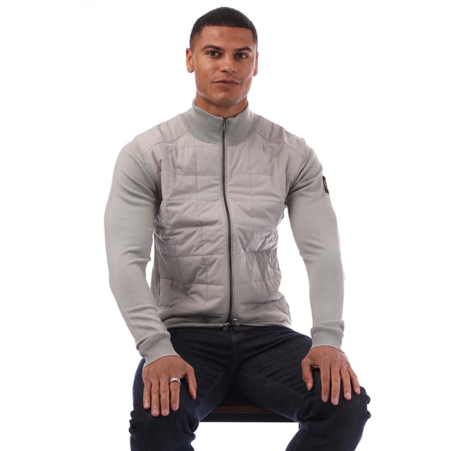Mens Belstaff Kelbrook Zip Cardigan in chrome grey.- Ribbed stand-up collar.- Two-way zip centre front closure- Ribbed cuffs and hem.- Channel quilted shoulder reinforcement detailing- Quilted mixed media body- Belstaff phoenix patch on left sleeve- Non-mulesed  extra fine merino wool.- Slim fit.- Body: 100% Wool. Woven: 100% Polyester. Filling: 100% Polyester.  Hand wash - dry clean.- Ref: 105303CRGRY