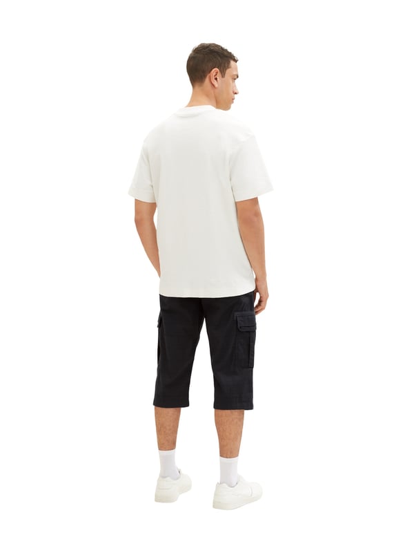 Schicke Max Overnee Cargohosen für Herren der Marke TOM TAILOR. Sehr angenehm zu tragen, bequem und sportlich zugleich geschnitten. Durch die schlichte Ausführung lässt sich diese Cargo perfekt zu deinem lässigen Look kombinieren. Ausreichend Taschen bieten Platz für alle Habseligkeiten. Baumwollmischung, Knopf mit Reißverschluss, Regular Fit, niedrige Leibhöhe, gerades Bein, gerader Saum.