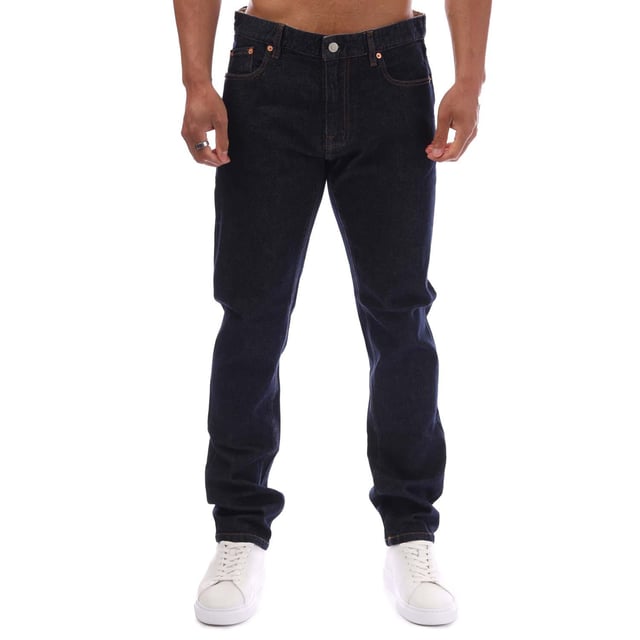 Mens Belstaff Rinsed Denim Longton Slim Fit Jeans in indigo.- 5-pocket construction.- Reinforced seat pockets.- Zip fly and button fastening.- Belstaff badge at back waist.- Embroidered phoenix patch at rear right pocket.- Mid rise.- Slim fit.- Regular inside leg length approx. 32  Long inside leg length approx. 34.- Main material: 100% Cotton.  Pocket lining: 65% Cotton  35% Polyester.  Machine washable.- Ref: 104242INDGOMeasurements are intended for guidance only.