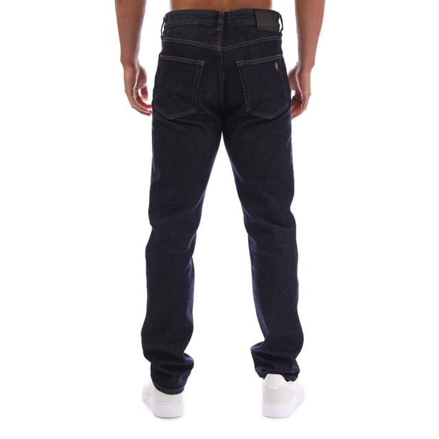 Mens Belstaff Longton Regular-Fit Jeans in indigo.- Zip fly and button fastening.- 5 pockets design.- Direct embroidered phoenix patch on rear pocket.- Branded leather patch.- Regular fit.- 99% Cotton  1% Elastane.- Ref: 105562INDGO
