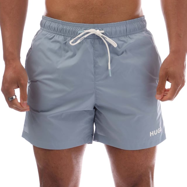 Mens Hugo Haiti Contrast Logo Swim Shorts in blue.- Elastic waistband with drawstring.- Side pockets.- Back pocket.- Quick-dry material.- 100% Polyamide.- Ref: 50469312483